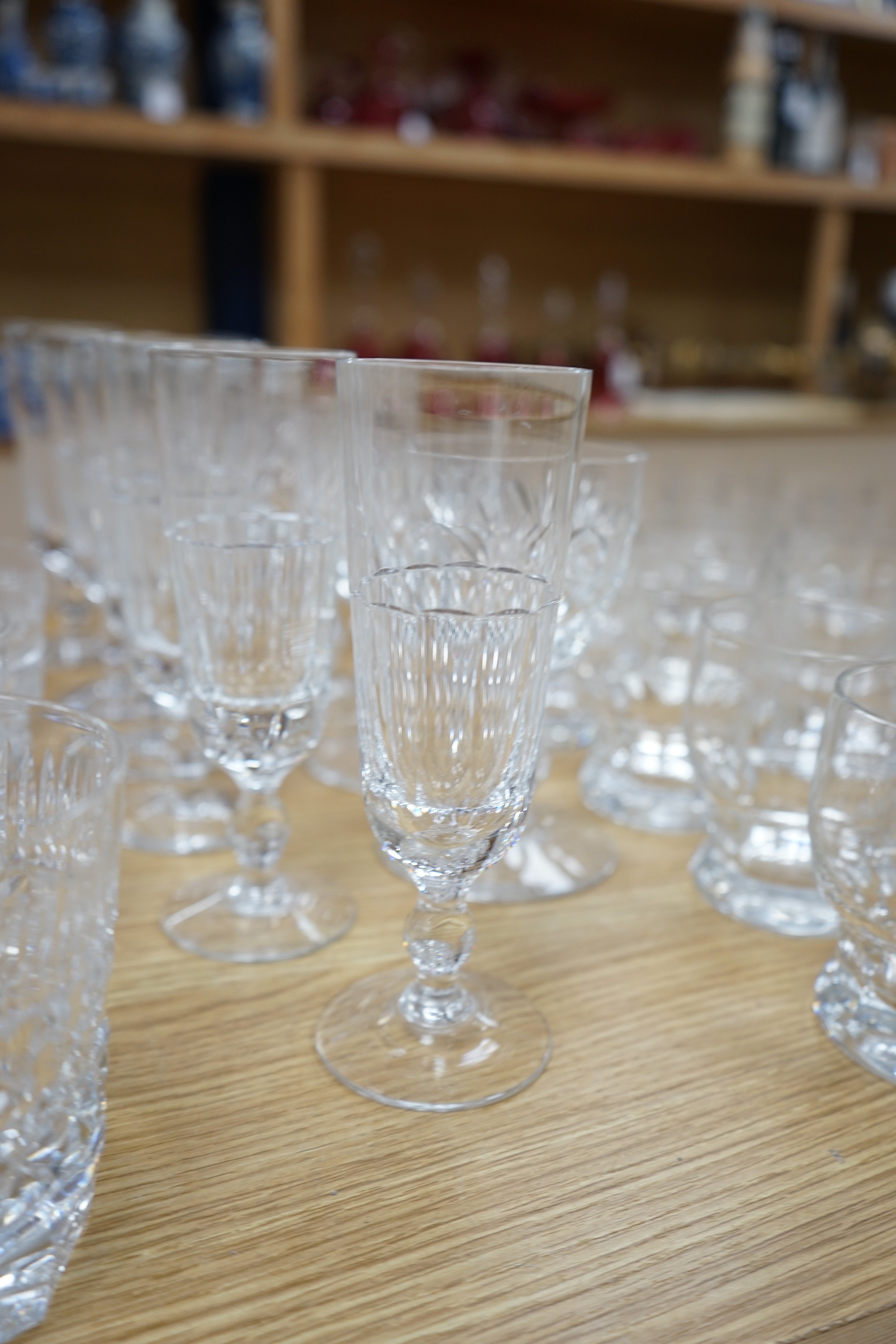 A collection of drinking glasses, including wine glasses, tumblers, champagne flutes, etc. Condition - good.